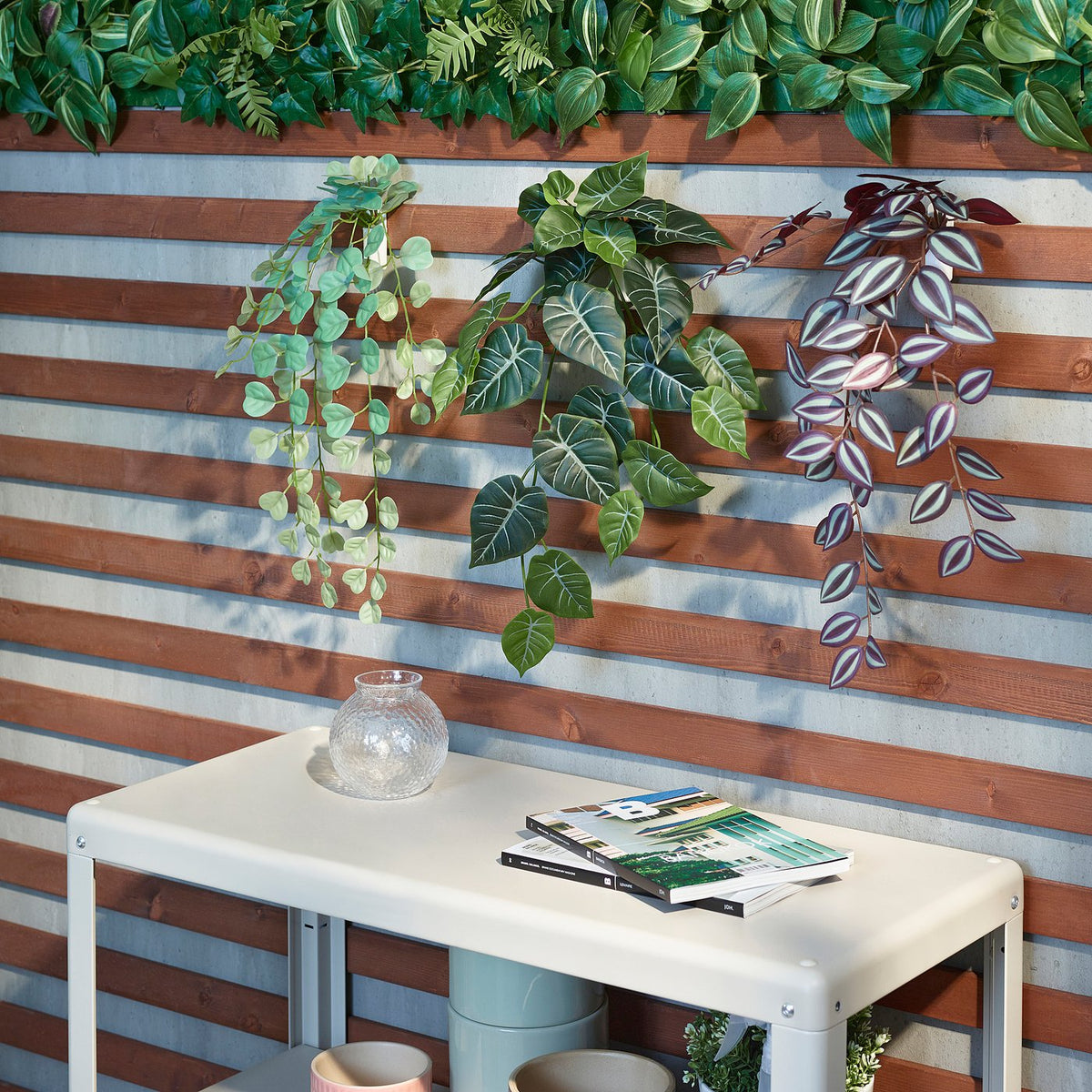 Artificial plant with wall holder
