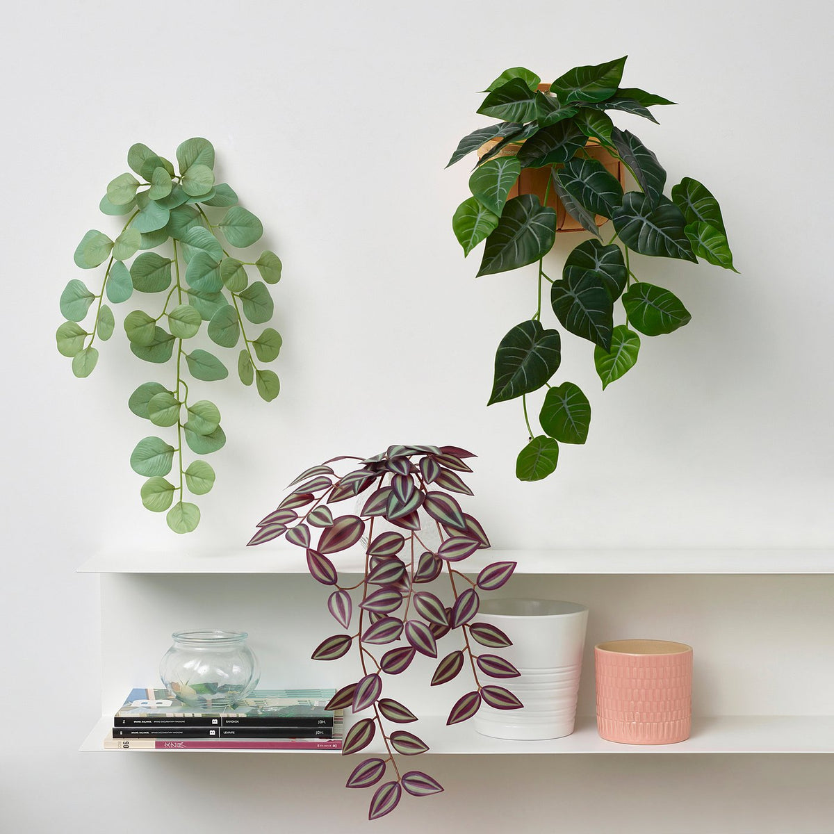 Artificial plant with wall holder