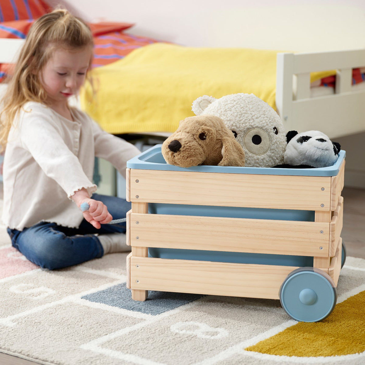 Toy storage with wheels