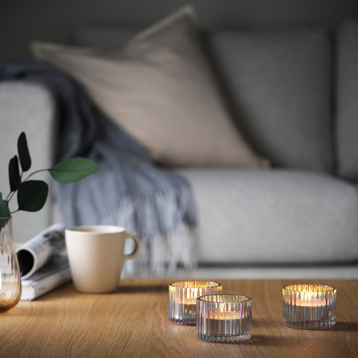 Unscented candle in metal cup