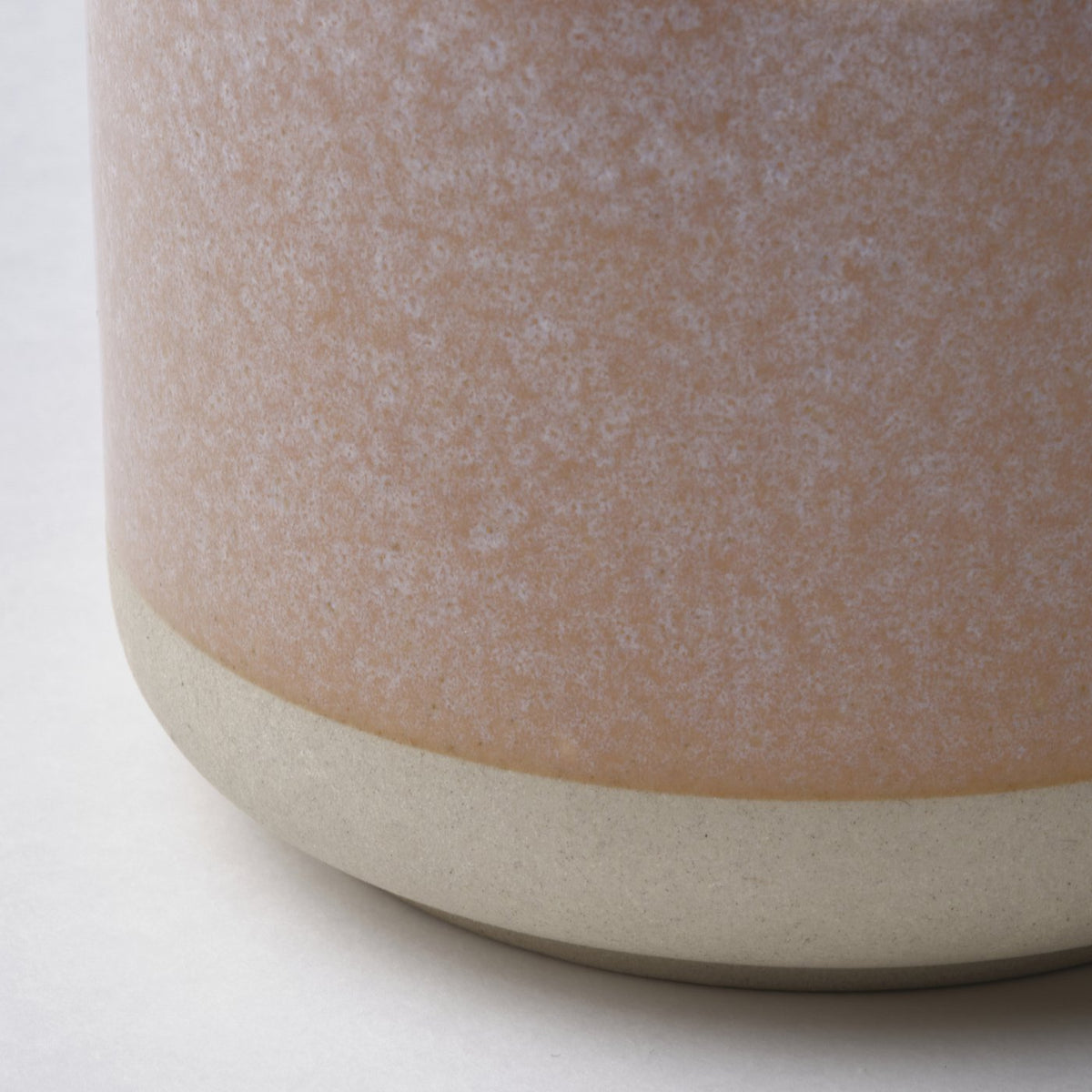 Scented candle in ceramic jar